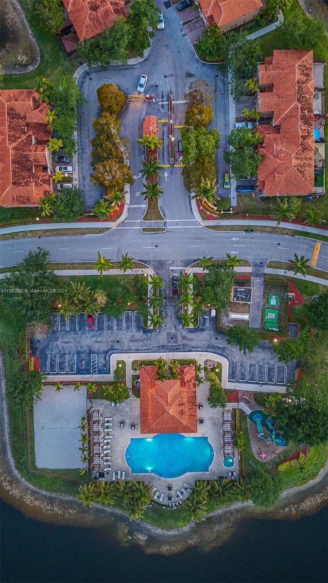 3091 Southwest 153rd Path Miami, FL 33185 - Photo 32 of 34 an aerial view of a house with garden space and street view