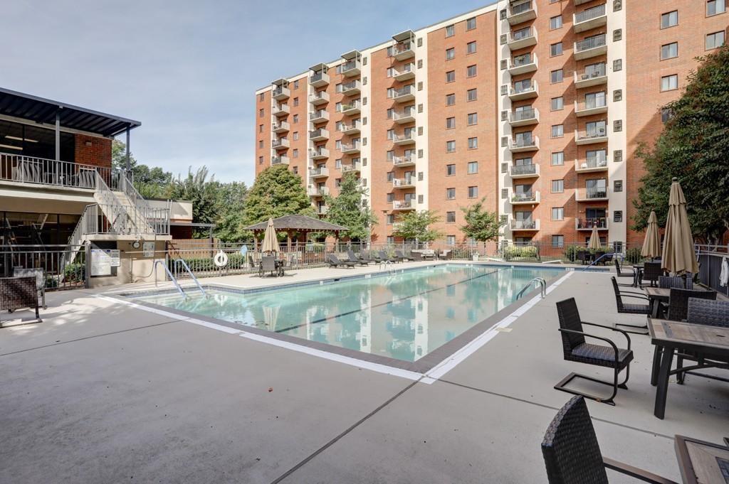 300 Johnson Ferry Road, Unit A405 Atlanta, GA 30328 - Photo 11 of 15 a view of building with outdoor space