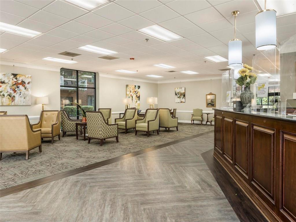 300 Johnson Ferry Road, Unit A405 Atlanta, GA 30328 - Photo 15 of 15 a very nice looking living room with a large window