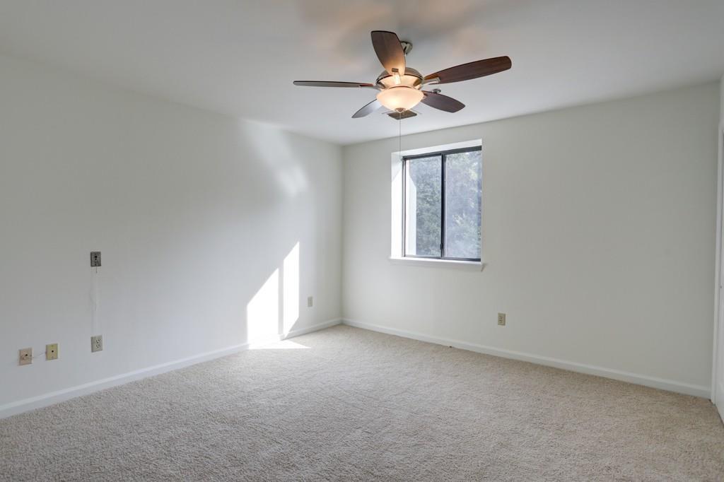 300 Johnson Ferry Road, Unit A405 Atlanta, GA 30328 - Photo 4 of 15 a view of an empty room with a window