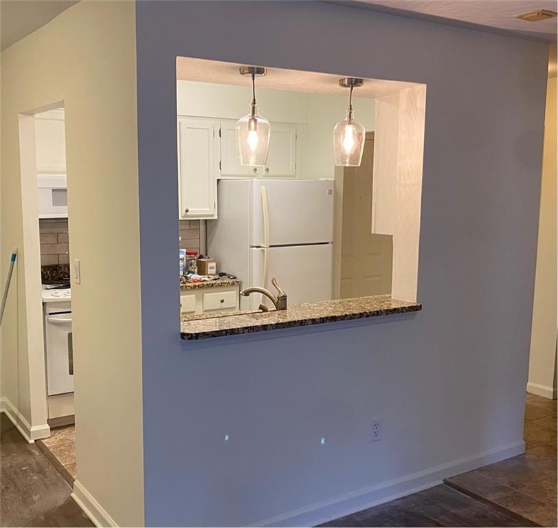 300 Johnson Ferry Road, Unit A405 Atlanta, GA 30328 - Photo 6 of 15 a bathroom with a sink and a mirror