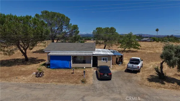 a car parked in front of the house