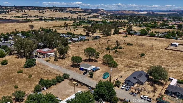 an aerial view of a city with ocean view