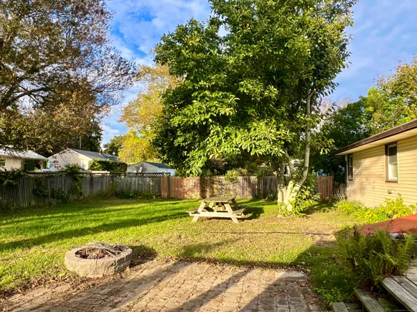 a view of a backyard with a garden