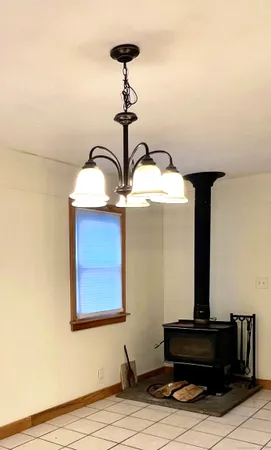a lamp on a table and a mirror