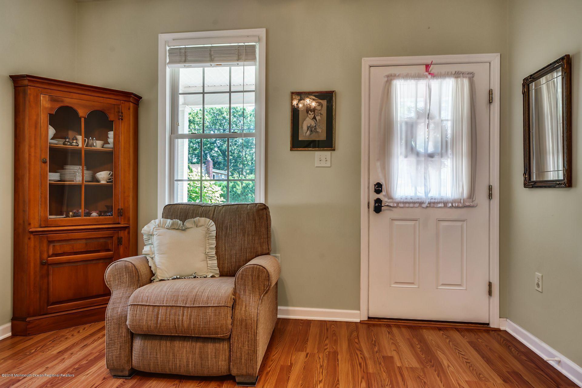 2569 Crestview Road Manasquan, NJ 08736 - Photo 11 of 35 a living room with furniture and wooden floor