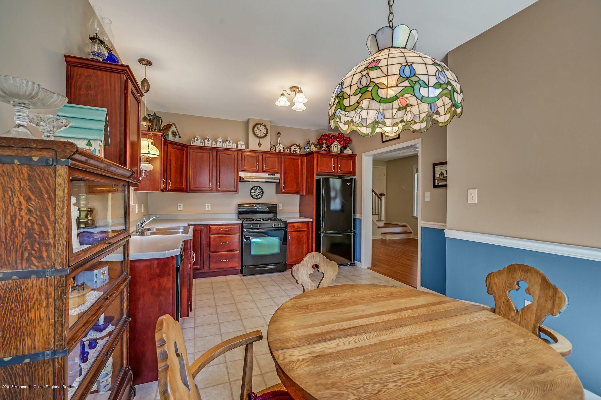2569 Crestview Road Manasquan, NJ 08736 - Photo 22 of 35 a view of a dining room with furniture