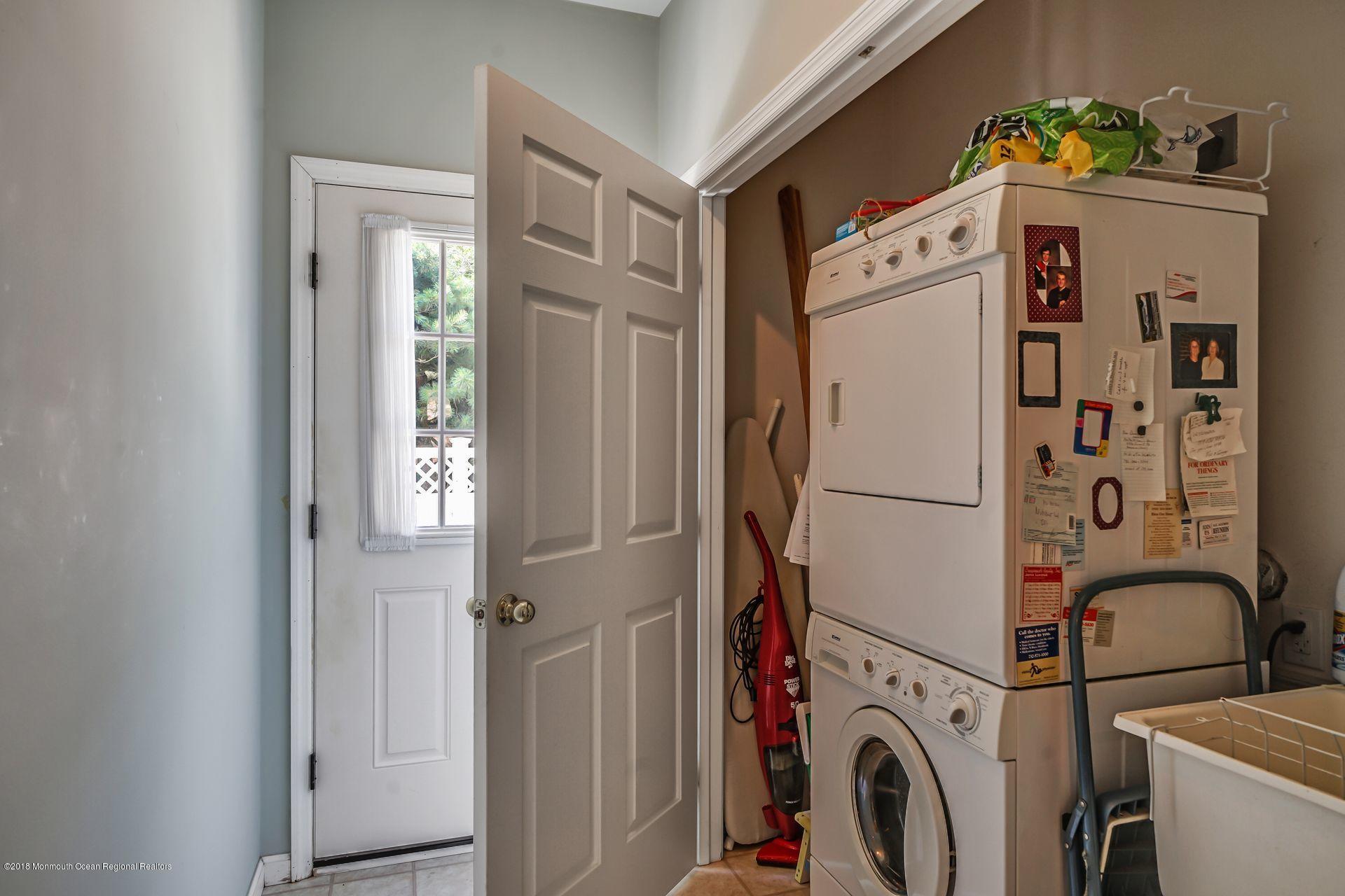 2569 Crestview Road Manasquan, NJ 08736 - Photo 23 of 35 a utility room with dryer and washer