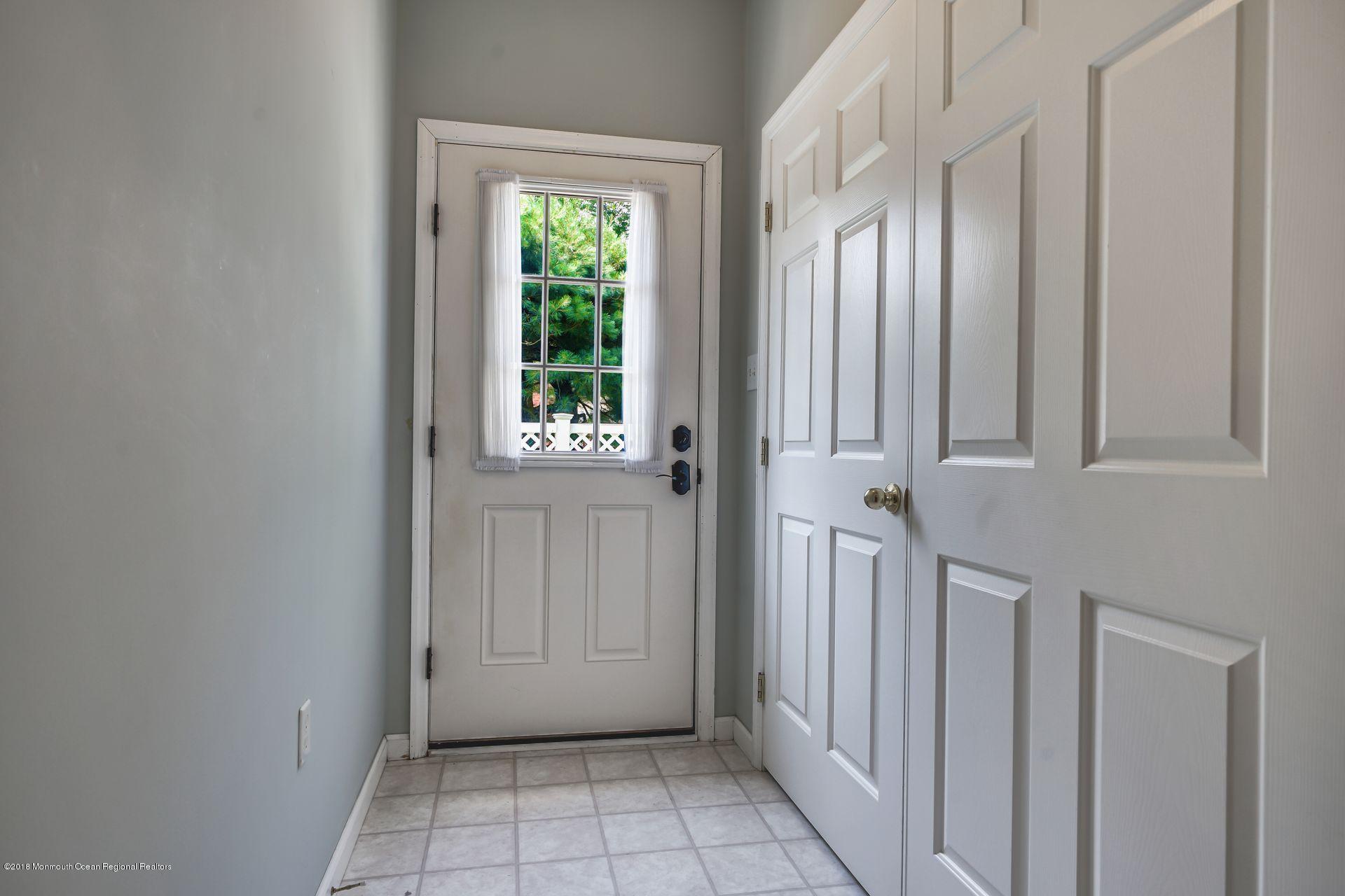 2569 Crestview Road Manasquan, NJ 08736 - Photo 24 of 35 a view of an entryway with staircase