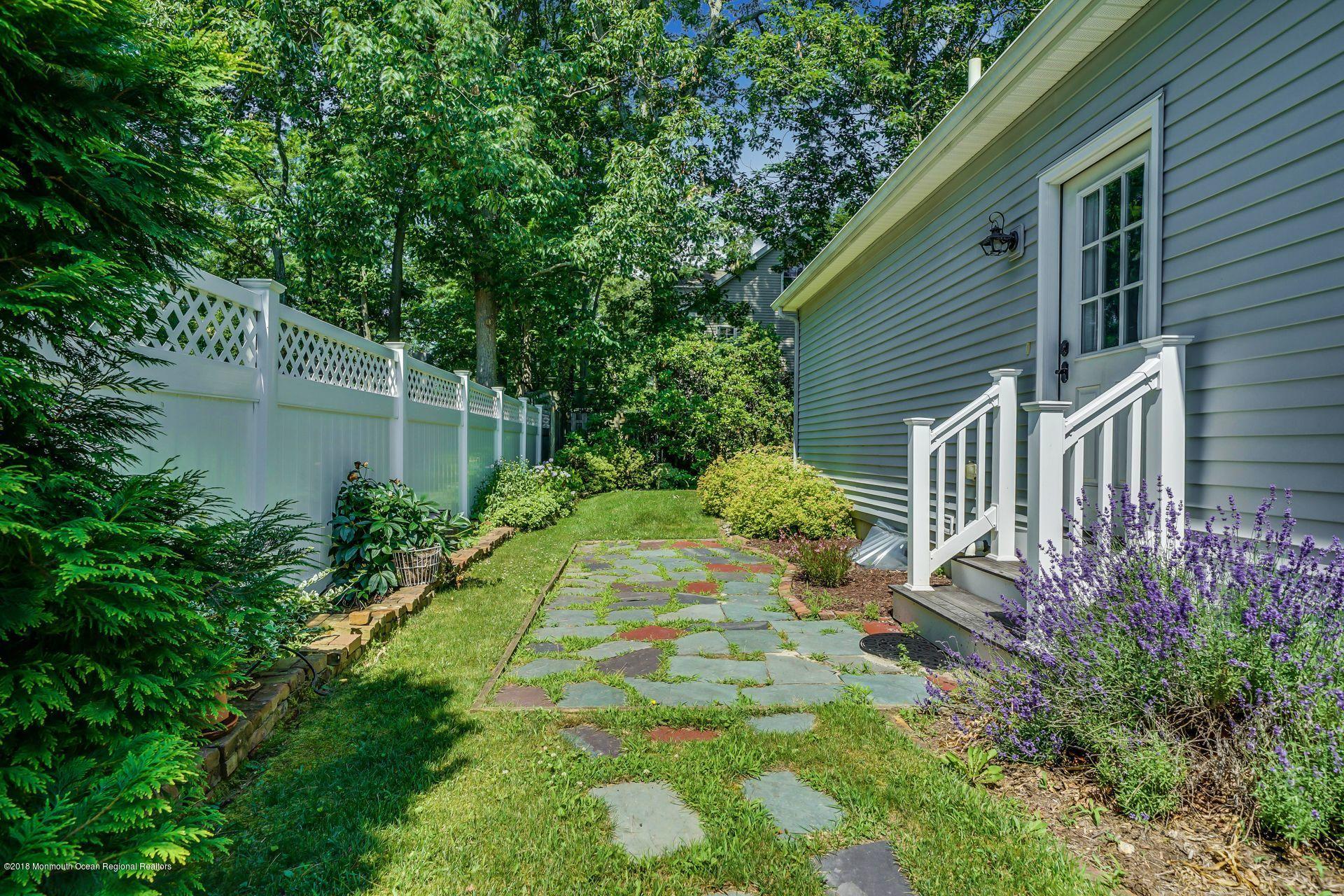 2569 Crestview Road Manasquan, NJ 08736 - Photo 33 of 35 a view of a backyard with plants