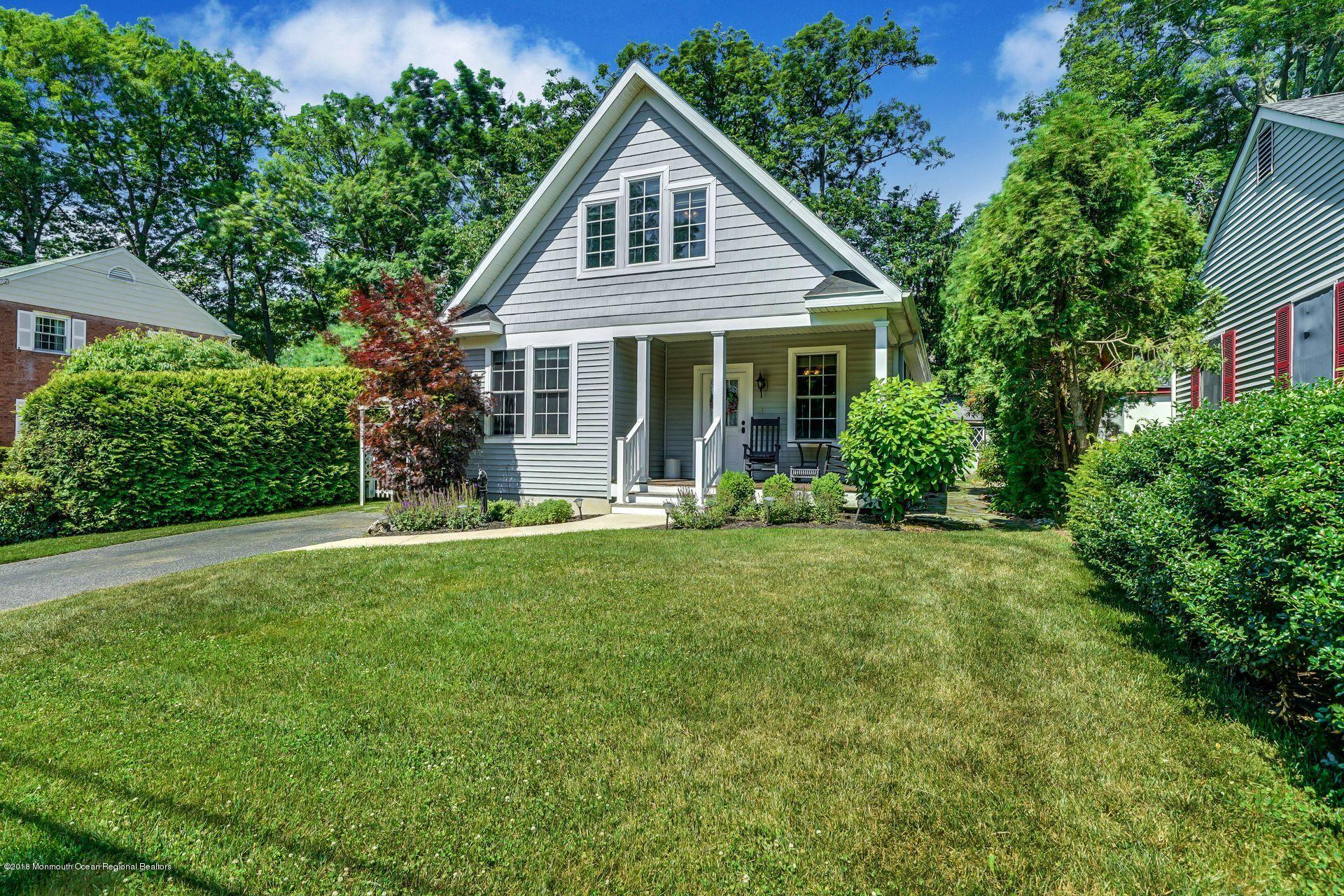 2569 Crestview Road Manasquan, NJ 08736 - Photo 5 of 35 a front view of house with yard and green space