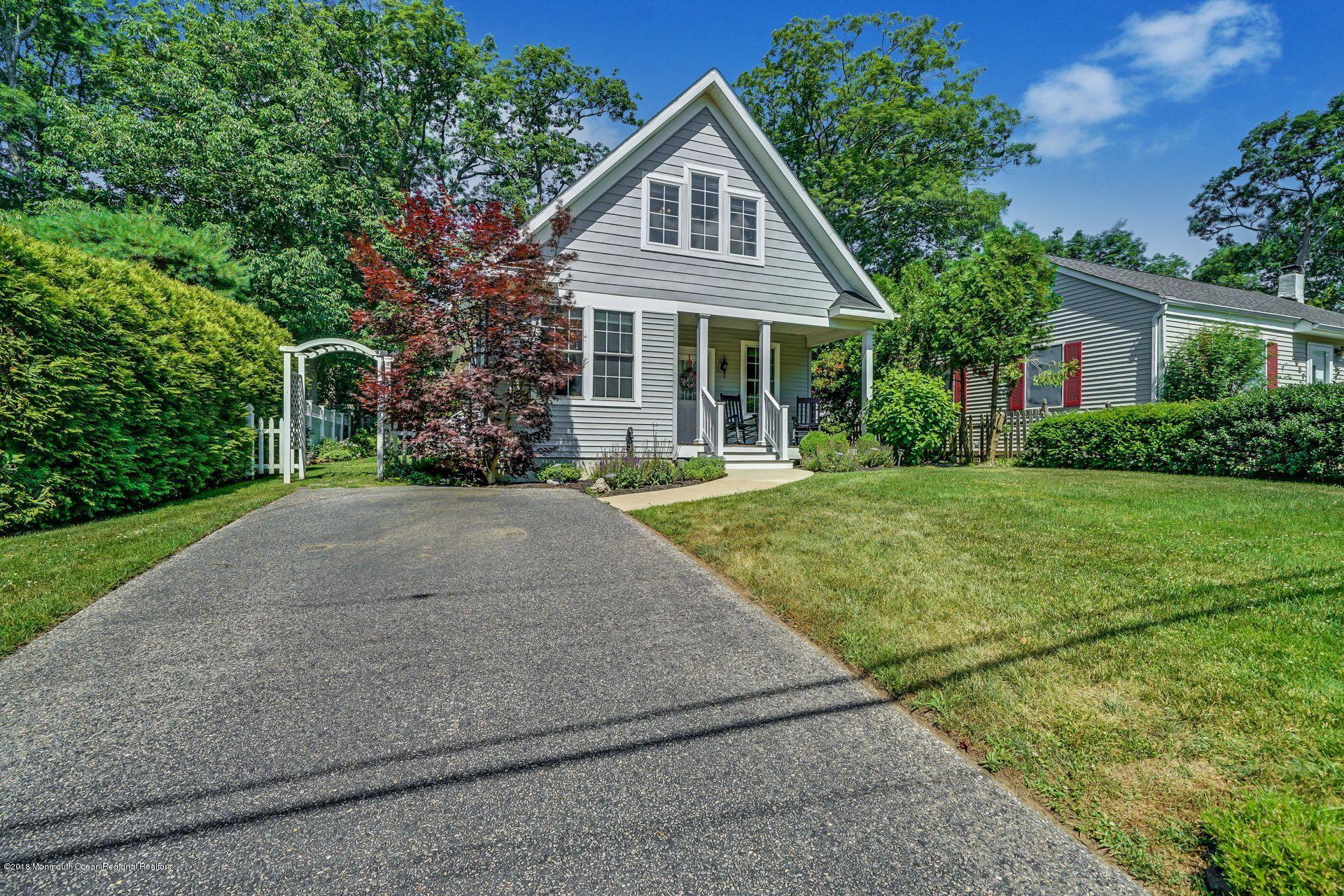 2569 Crestview Road Manasquan, NJ 08736 - Photo 7 of 35 a front view of a house with a yard