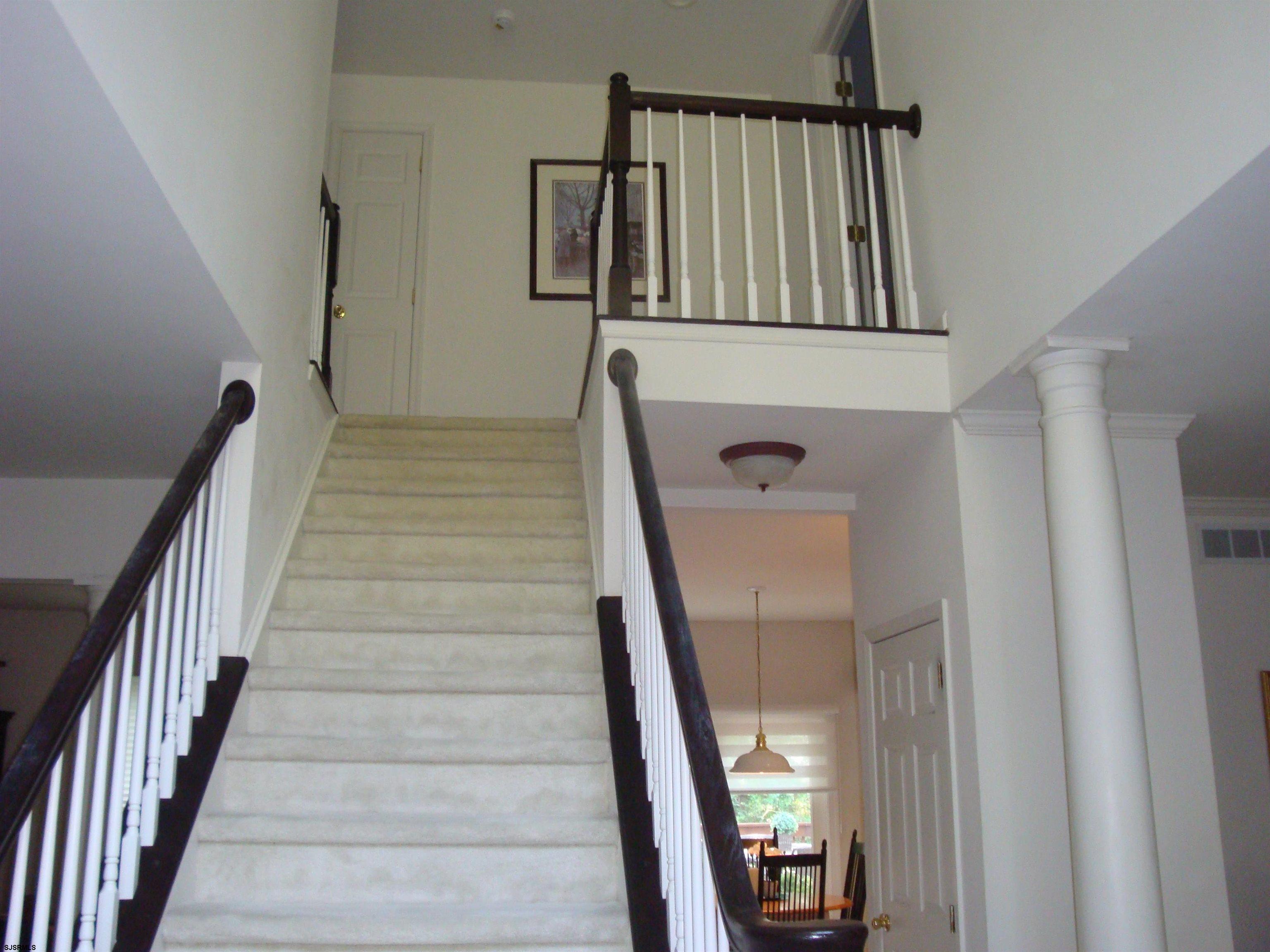 6 Devon Drive Egg Harbor Township, NJ 08234 - Photo 4 of 23 a view of staircase with railing and white walls