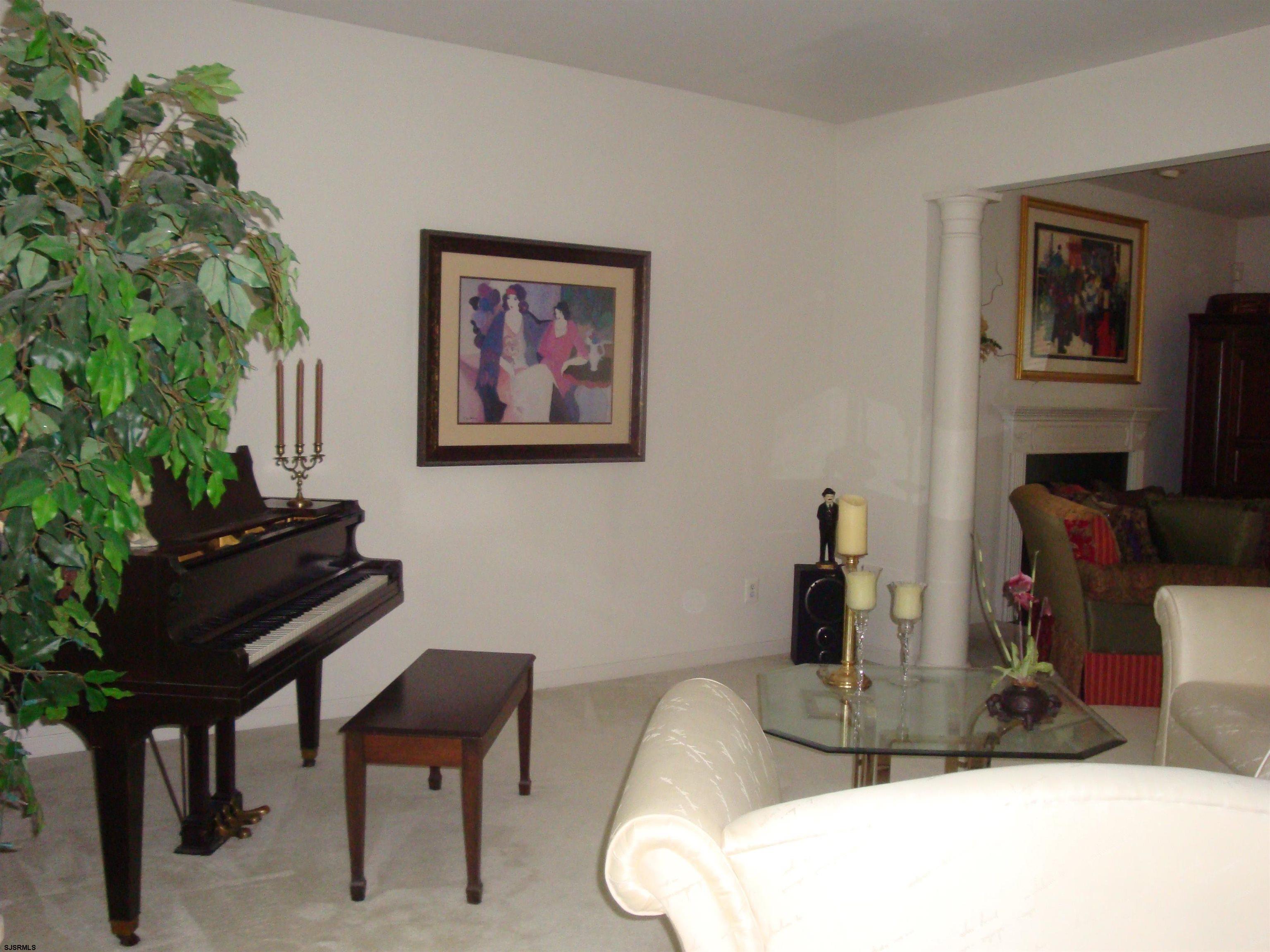 6 Devon Drive Egg Harbor Township, NJ 08234 - Photo 5 of 23 a room with furniture and a potted plant