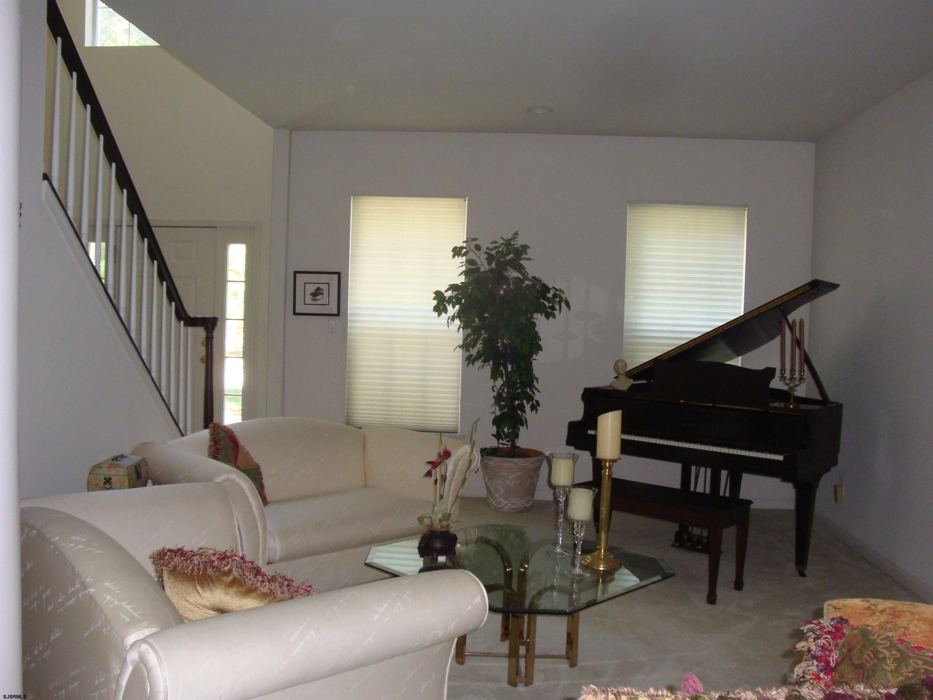 6 Devon Drive Egg Harbor Township, NJ 08234 - Photo 6 of 23 a living room with furniture and a potted plant