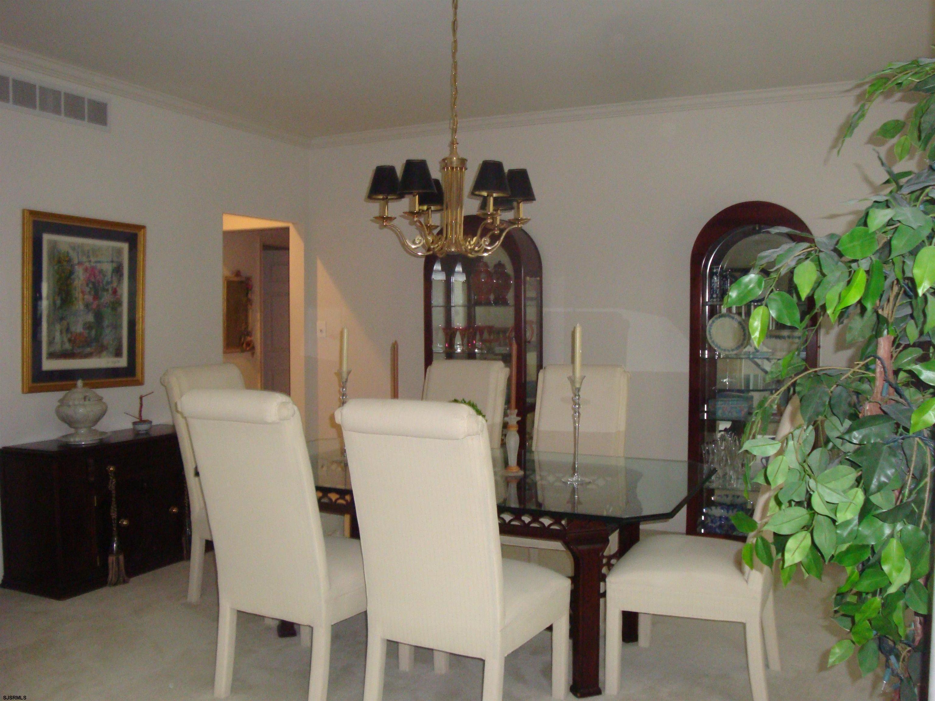 6 Devon Drive Egg Harbor Township, NJ 08234 - Photo 7 of 23 a dining room with furniture and window
