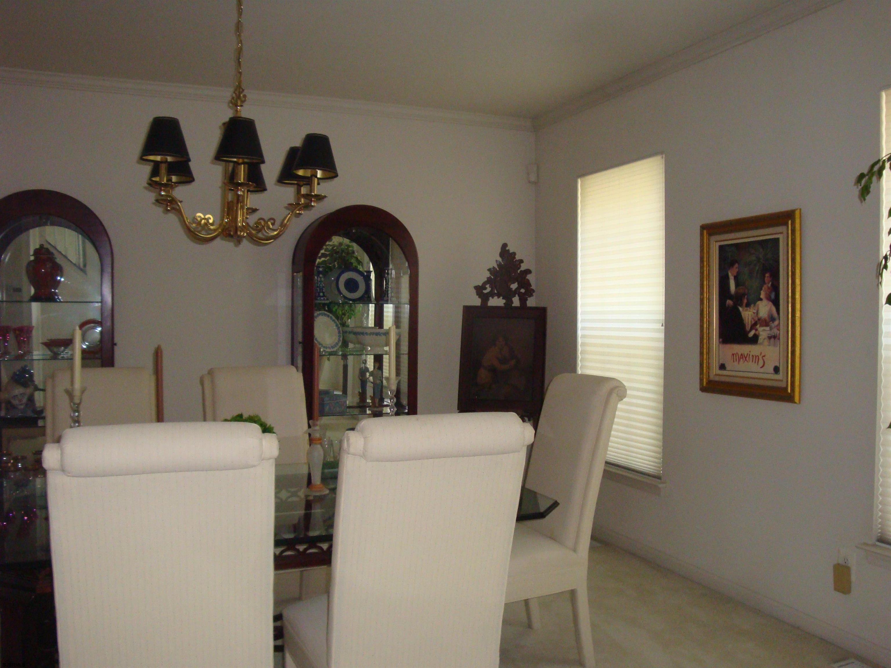 6 Devon Drive Egg Harbor Township, NJ 08234 - Photo 8 of 23 a view of dining room and front door