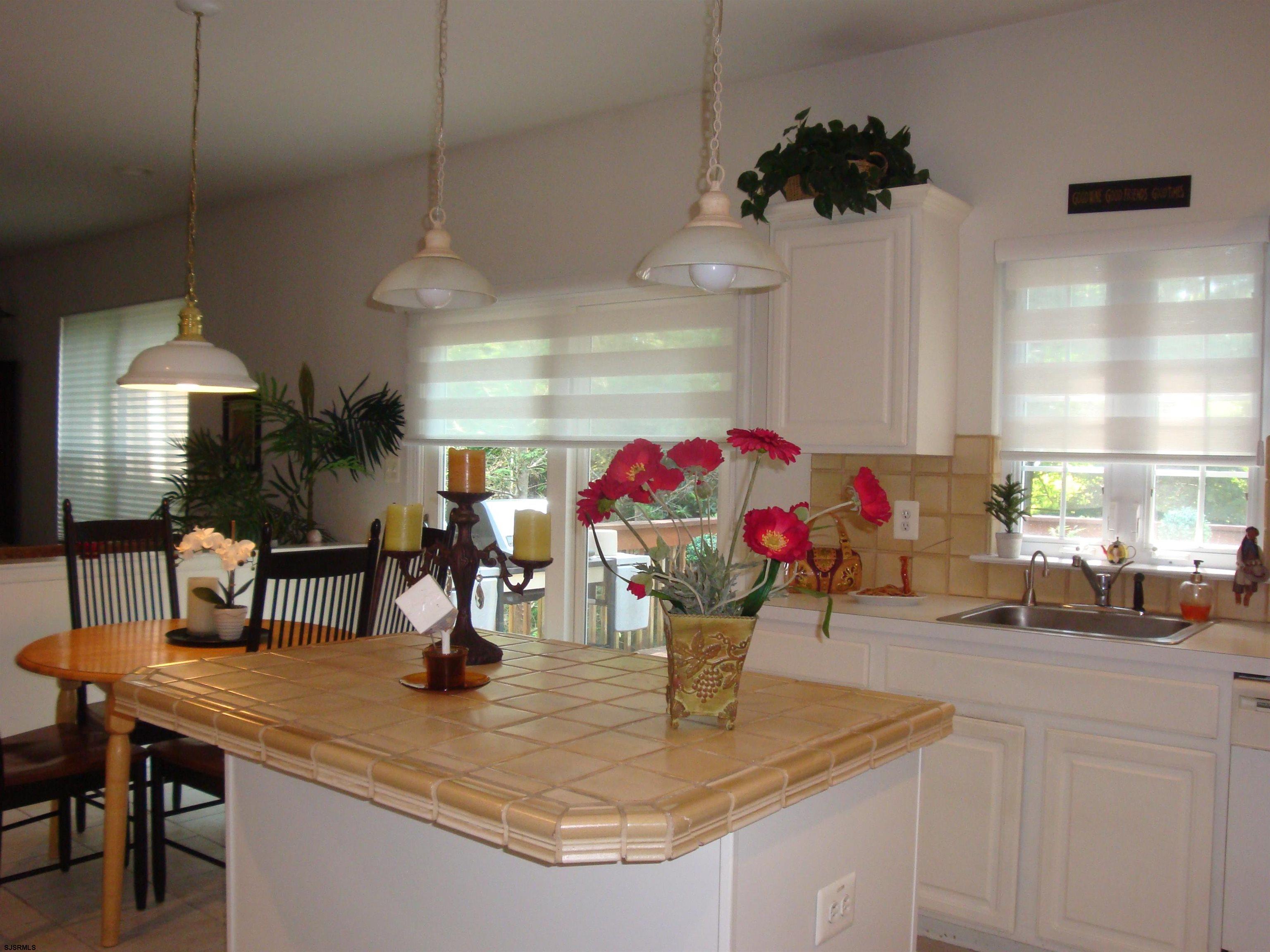 6 Devon Drive Egg Harbor Township, NJ 08234 - Photo 10 of 23 a view of kitchen and dining area with furniture