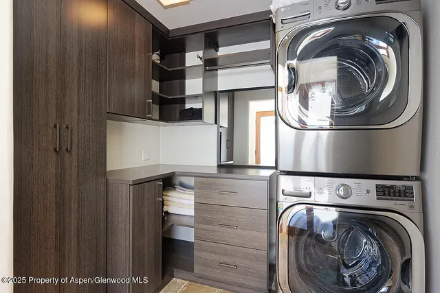a view of living room with balcony and furniture