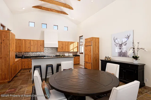 a view of a dining room with furniture