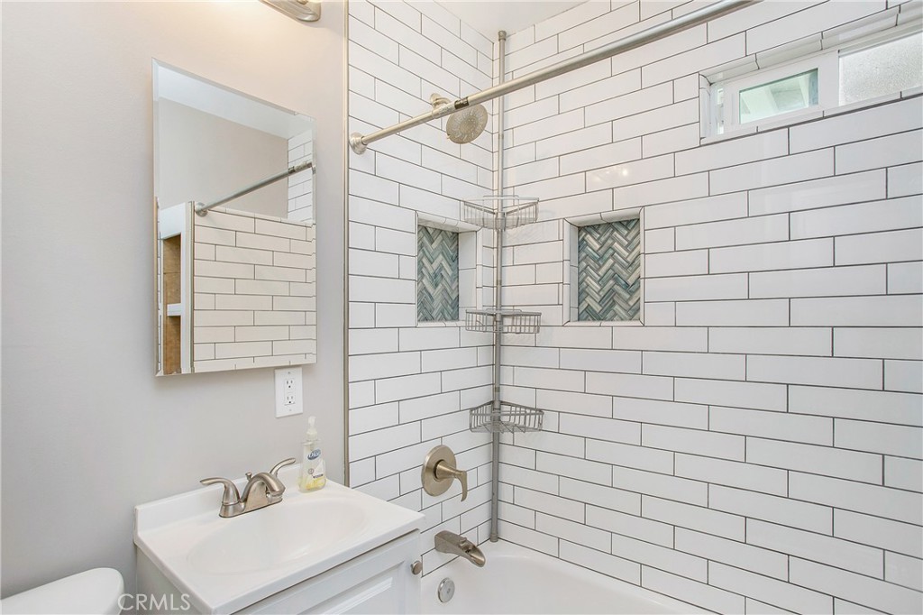 315 West Elm Street Brea, CA 92821 - Photo 5 of 14 a bathroom with a sink a toilet and shower