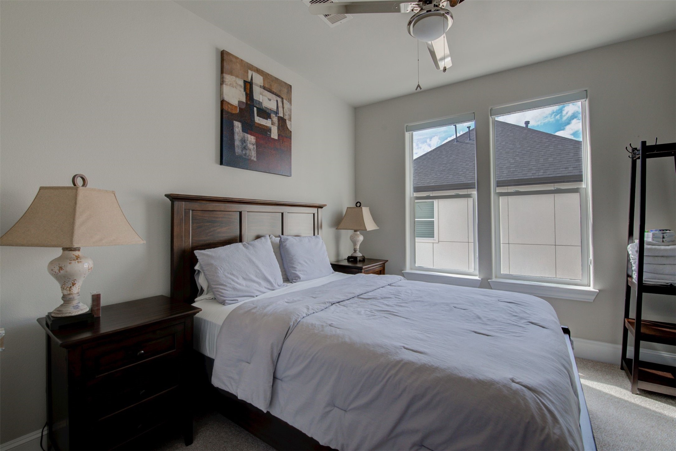 9664 Knight Road Houston, TX 77045 - Photo 25 of 33 a bedroom with a bed and wooden floor