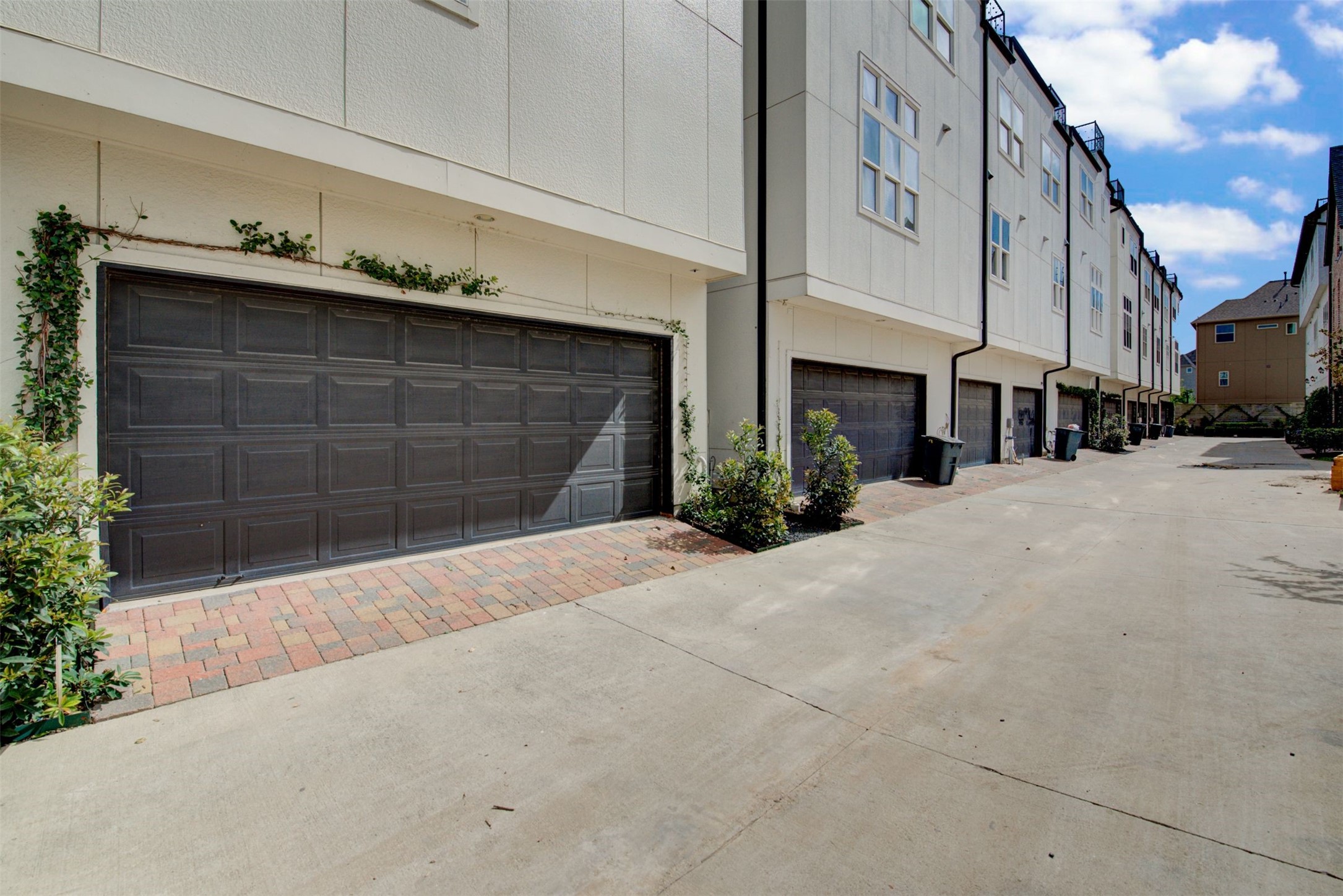 9664 Knight Road Houston, TX 77045 - Photo 29 of 33 a front view of a building with garage and trees