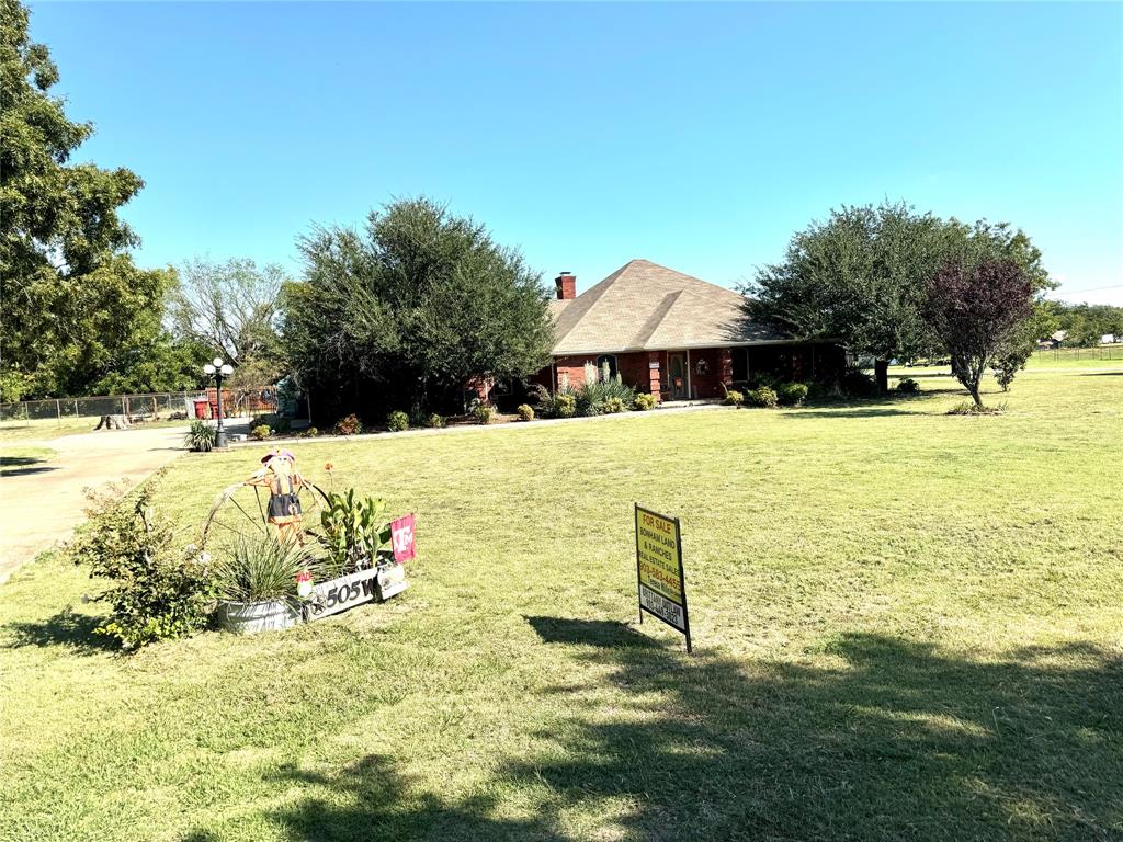 505 3rd Street Dodd City, TX 75438 - Photo 2 of 37 a view of swimming pool with a garden