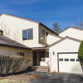 a view of a house with a garage