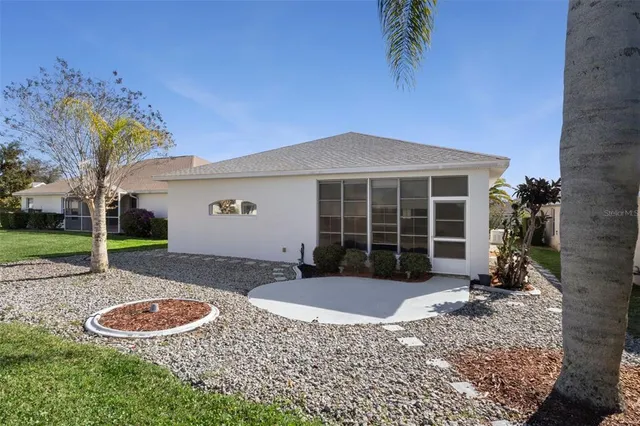 an aerial view of a residential houses and city view