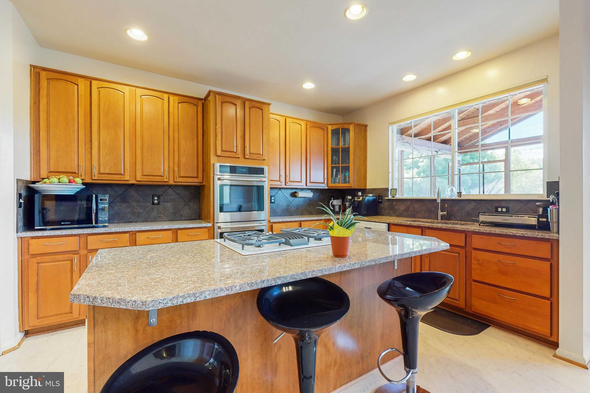 14326 Ashleigh Greene Road Boyds, MD 20841 - Photo 13 of 51 Center Island with Cooktop