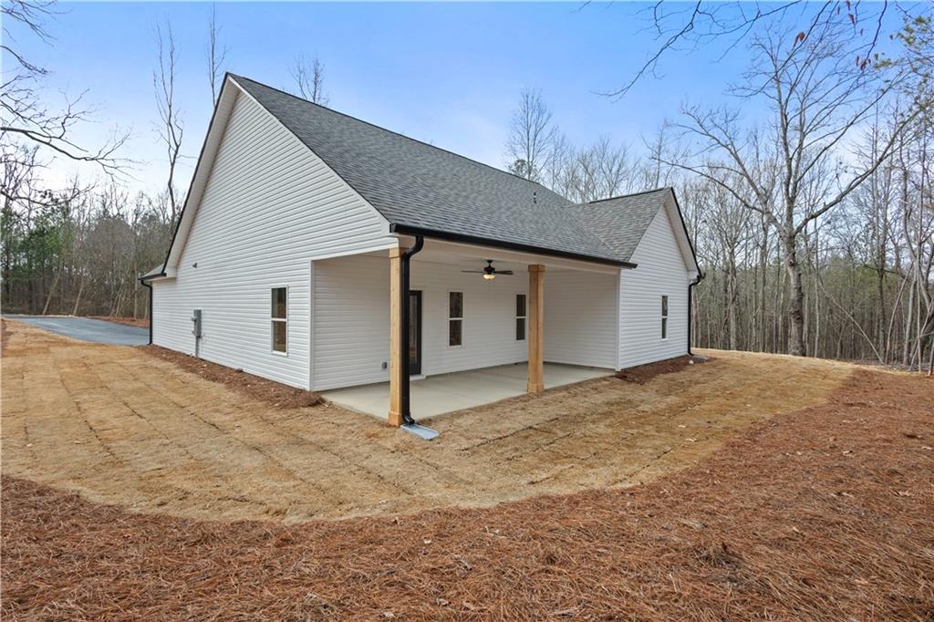 3230 Steadman Road Tallapoosa, GA 30176 - Photo 37 of 52 a view of a house with a yard