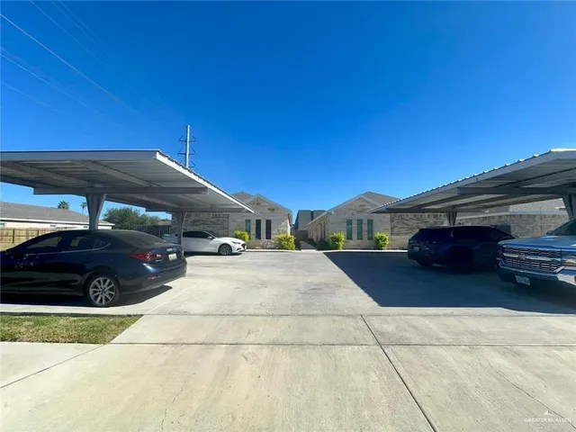 a view of a car parked in front of a building