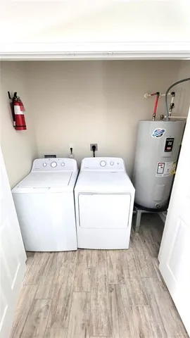 a utility room with washer and dryer