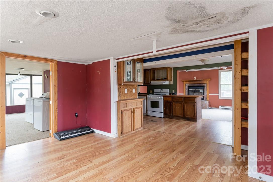 5 Cane Crest Circle Fairview, NC 28730 - Photo 13 of 13 a kitchen with stainless steel appliances granite countertop a refrigerator and a stove top oven