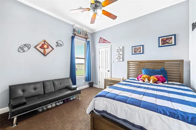 a bedroom with furniture and a couch