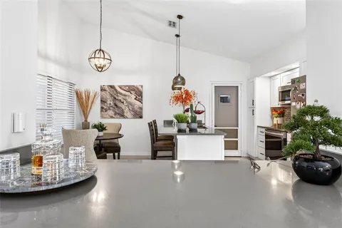 a view of living room with furniture and window