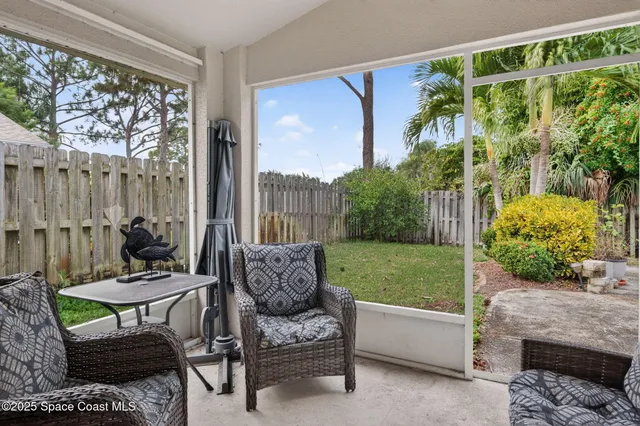 a outdoor living space with furniture and a garden