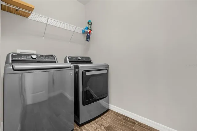 a utility room with dryer and washer