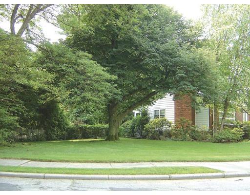 20 Wendell Road Newton, MA 02459 - Photo 11 of 11 a view of a white house in a big yard with large trees