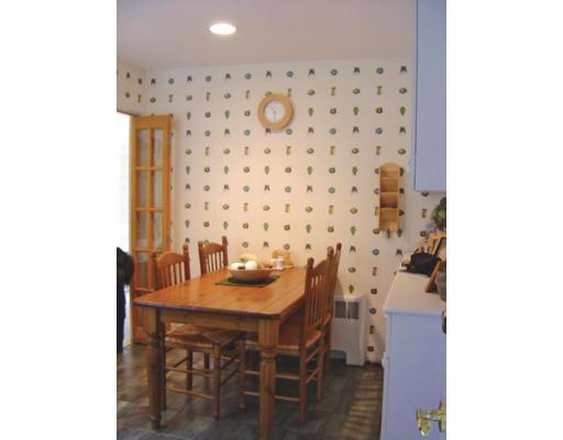 20 Wendell Road Newton, MA 02459 - Photo 7 of 11 a dining room with furniture and wooden floor