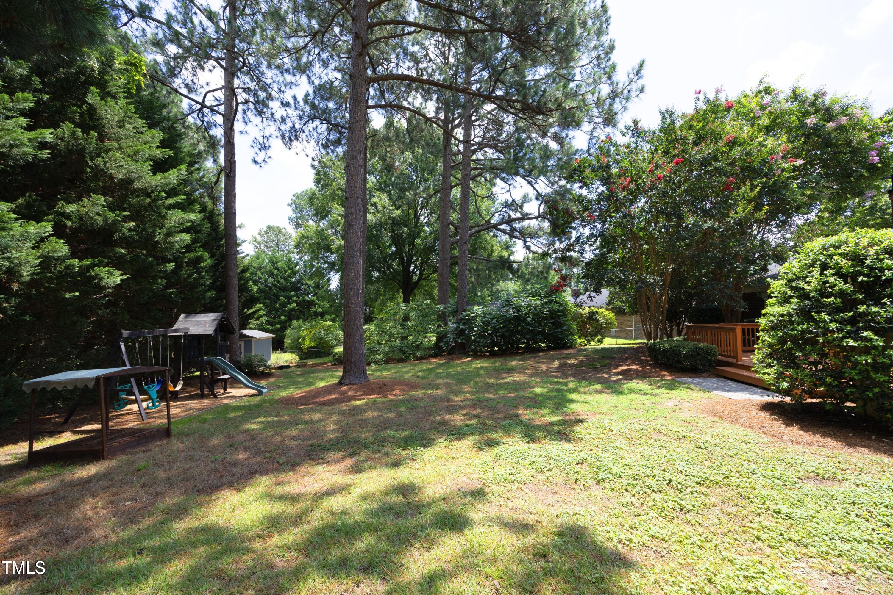 3112 Carovel Court Raleigh, NC 27607 - Photo 41 of 44 playground in shady back nook.