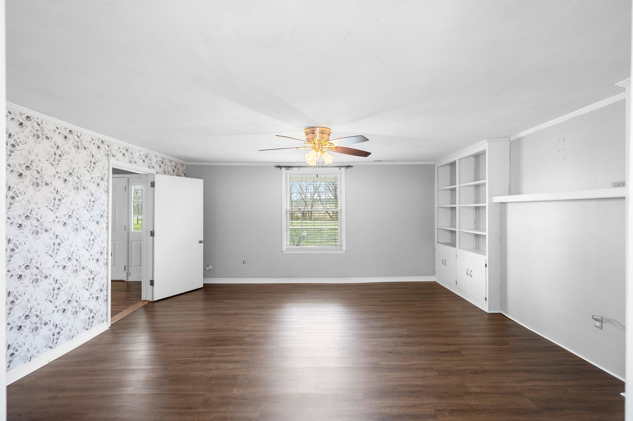 420 Beechwood Road Bell Buckle, TN 37020 - Photo 25 of 57 an empty room with wooden floor and windows