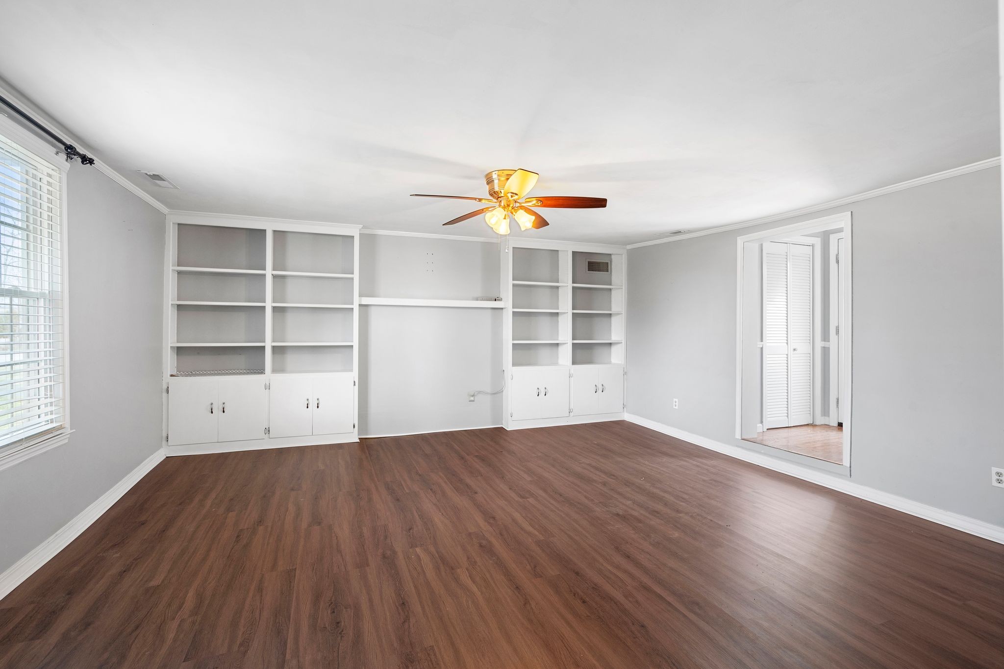 420 Beechwood Road Bell Buckle, TN 37020 - Photo 26 of 57 an empty room with wooden floor and window