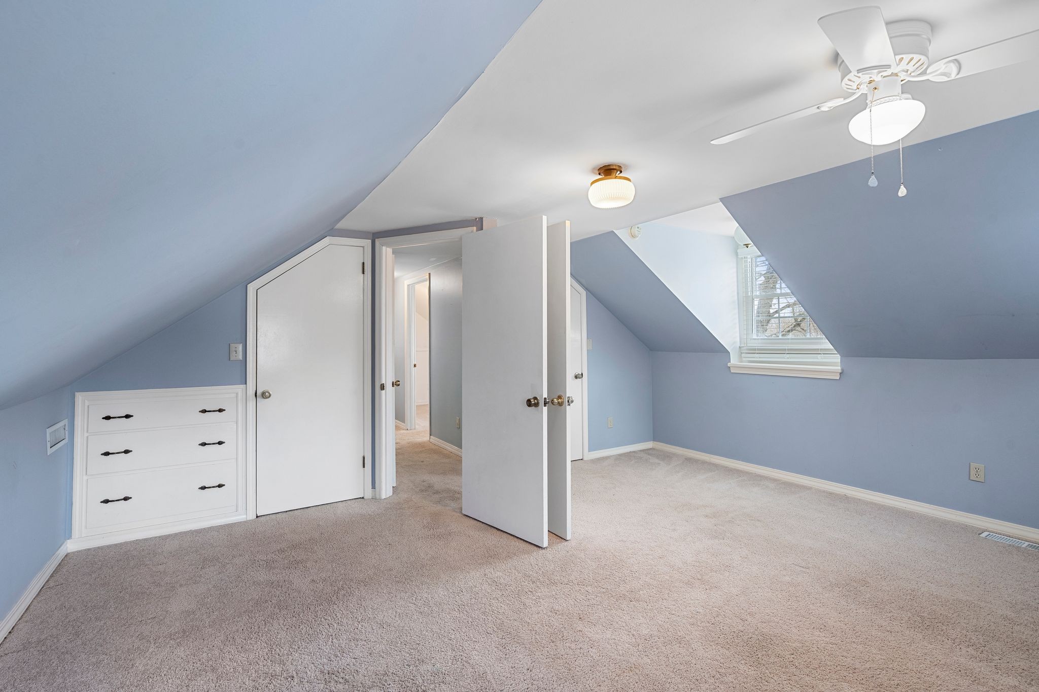 420 Beechwood Road Bell Buckle, TN 37020 - Photo 29 of 57 an empty room with a ceiling fan and closet area