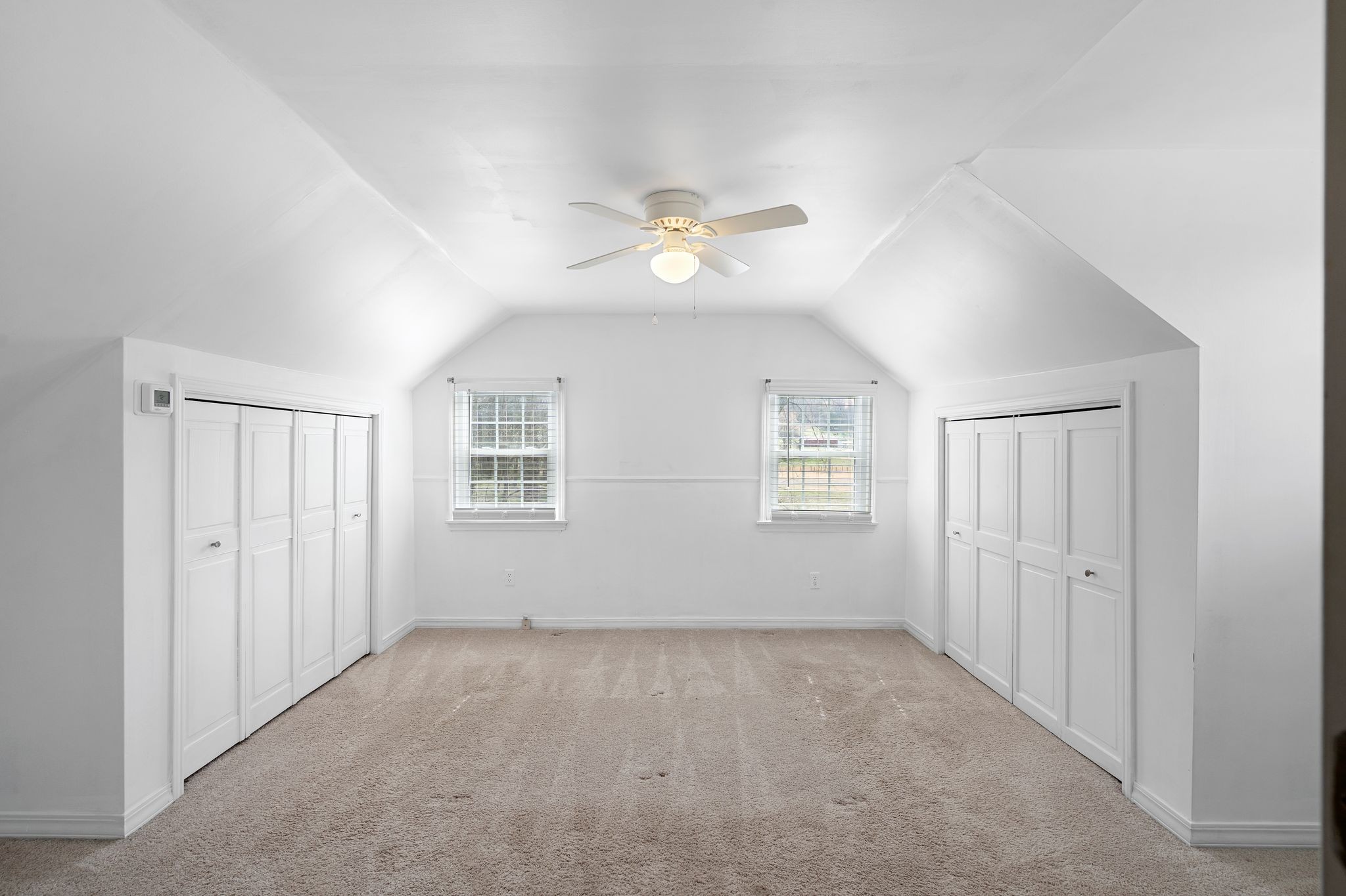 420 Beechwood Road Bell Buckle, TN 37020 - Photo 35 of 57 an empty room with ceiling fan and windows