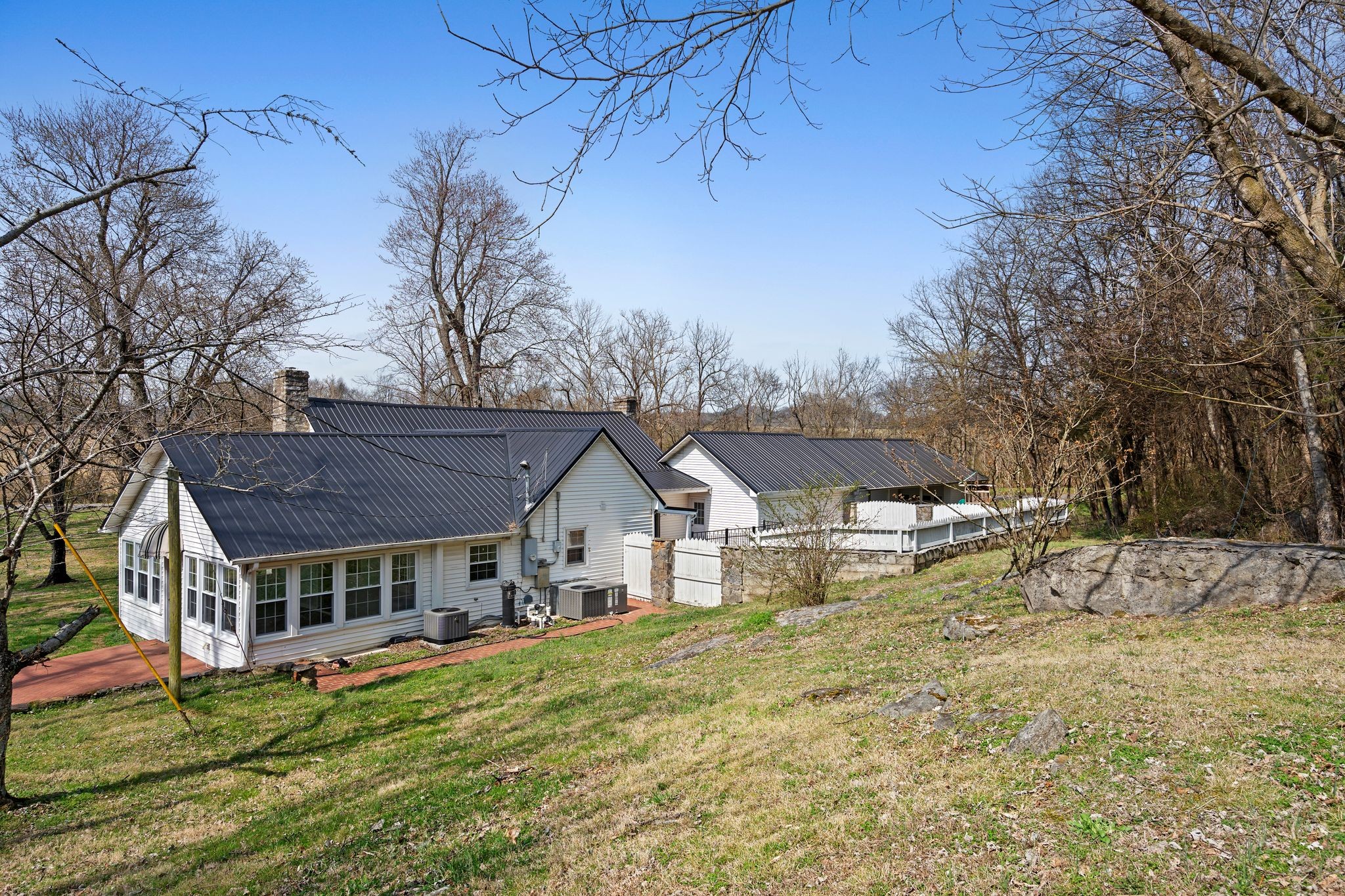 420 Beechwood Road Bell Buckle, TN 37020 - Photo 43 of 57 a front view of a house with a yard
