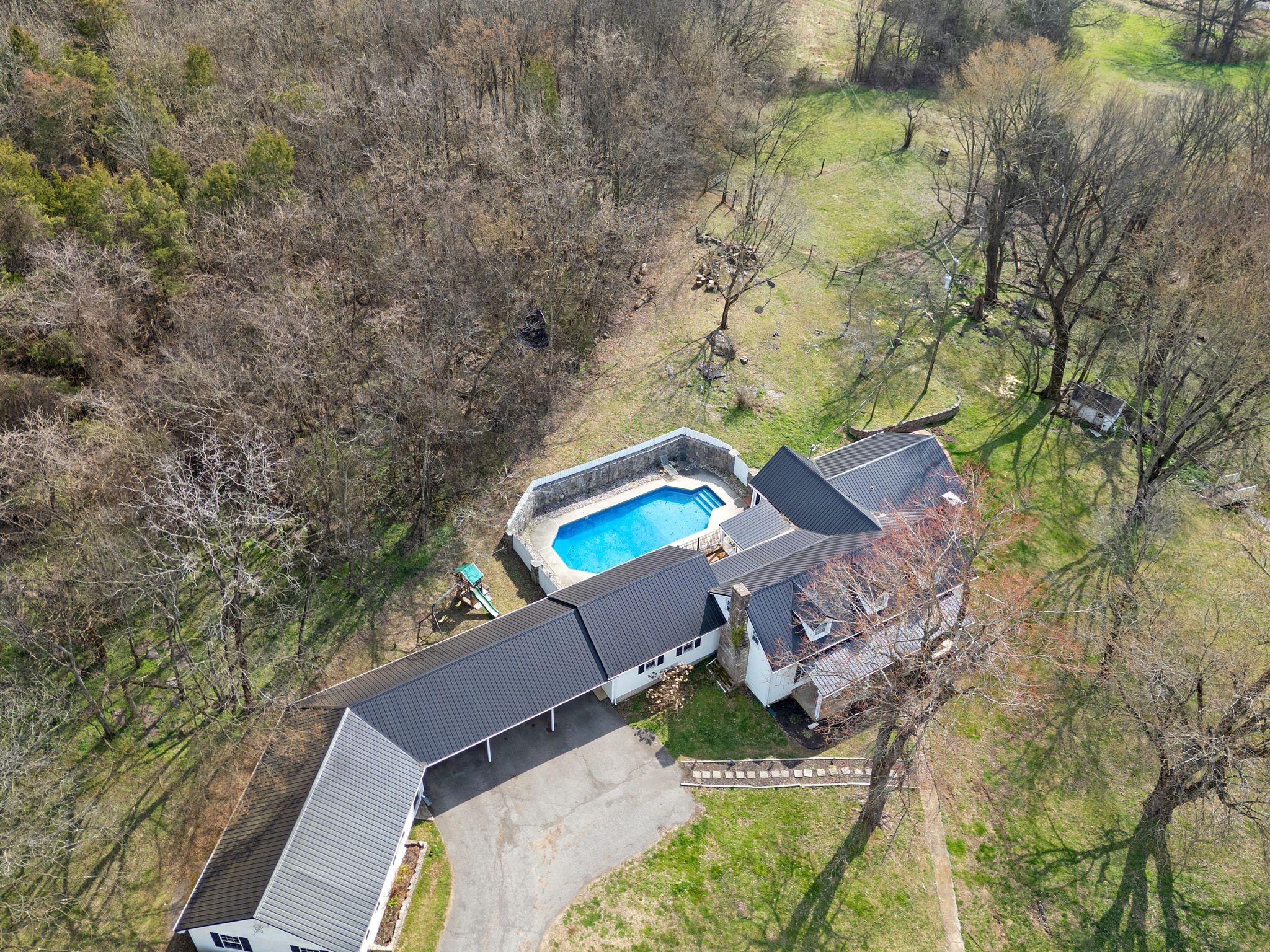 420 Beechwood Road Bell Buckle, TN 37020 - Photo 51 of 57 an aerial view of a house with swimming pool and outdoor space
