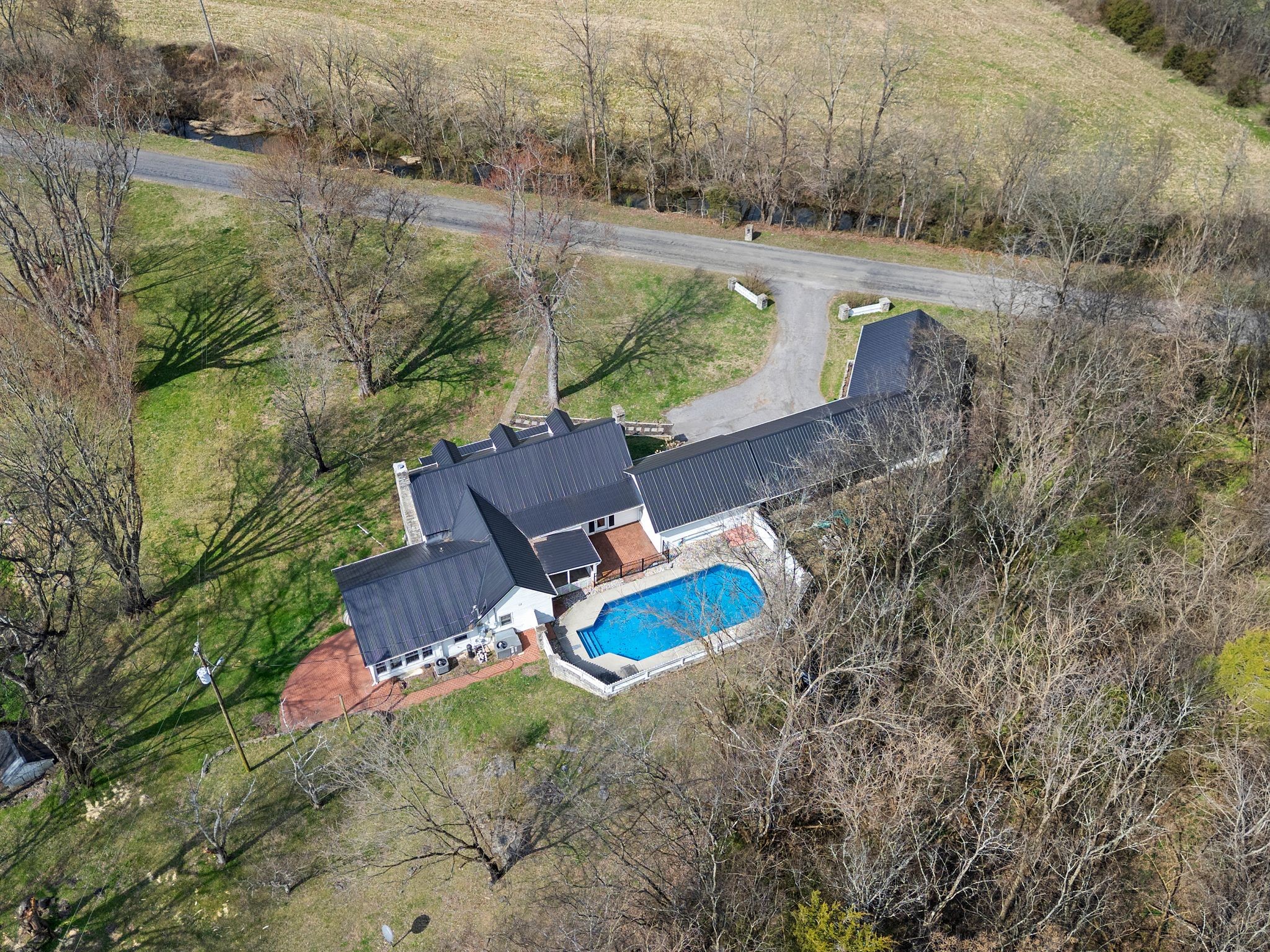 420 Beechwood Road Bell Buckle, TN 37020 - Photo 53 of 57 an aerial view of a house with a yard and lake