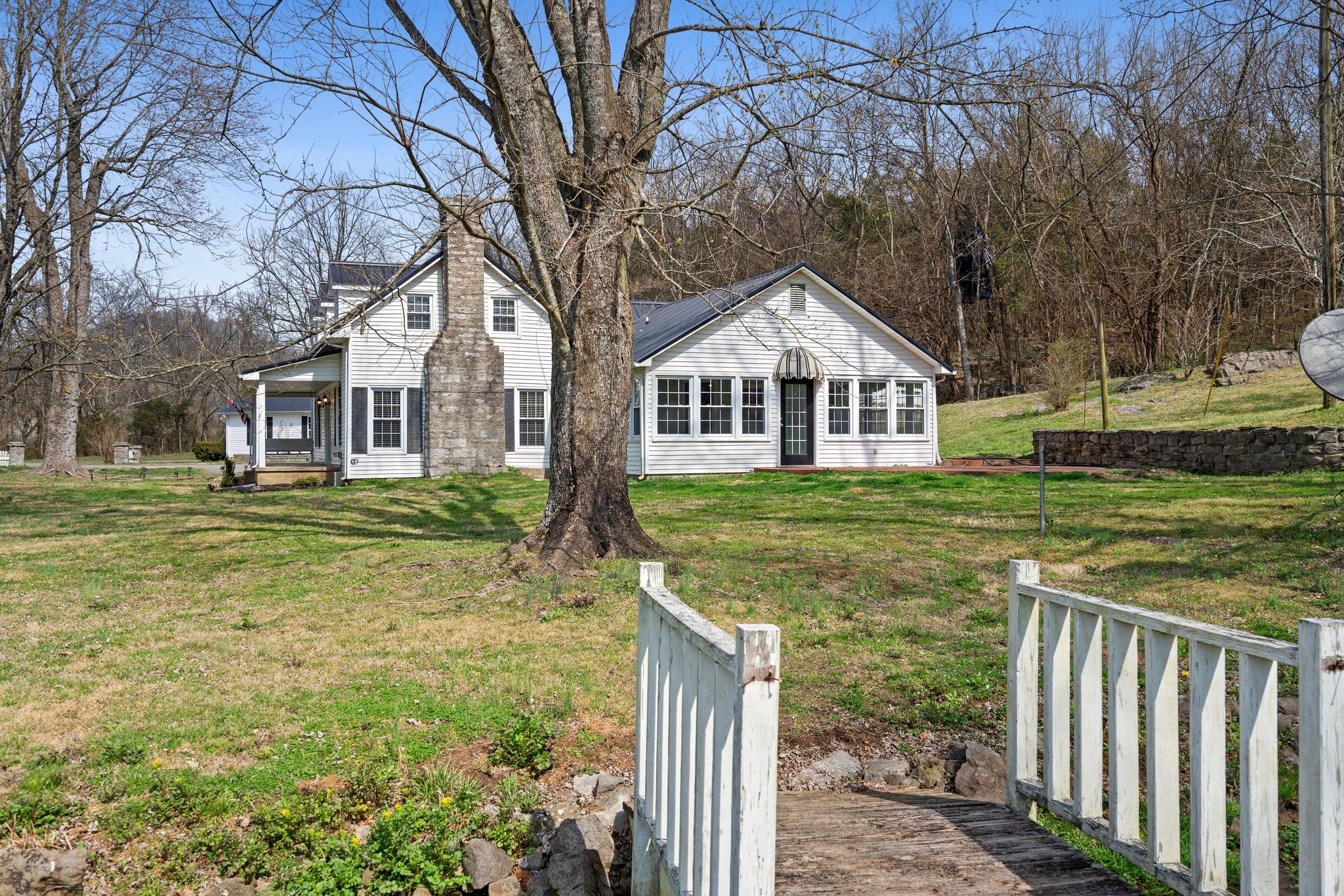420 Beechwood Road Bell Buckle, TN 37020 - Photo 9 of 57 a front view of a house with a yard